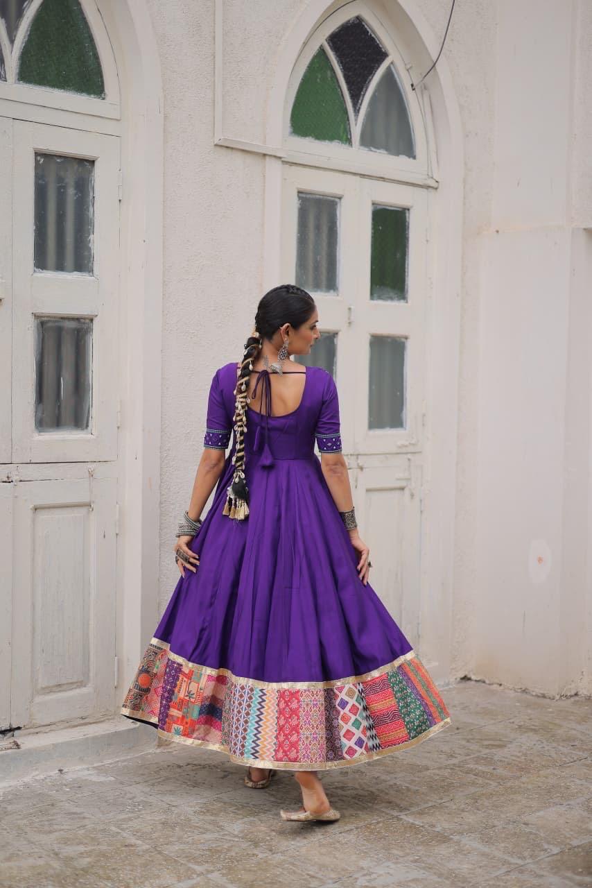 Back design of traditional Anarkali gown with elegant flare
