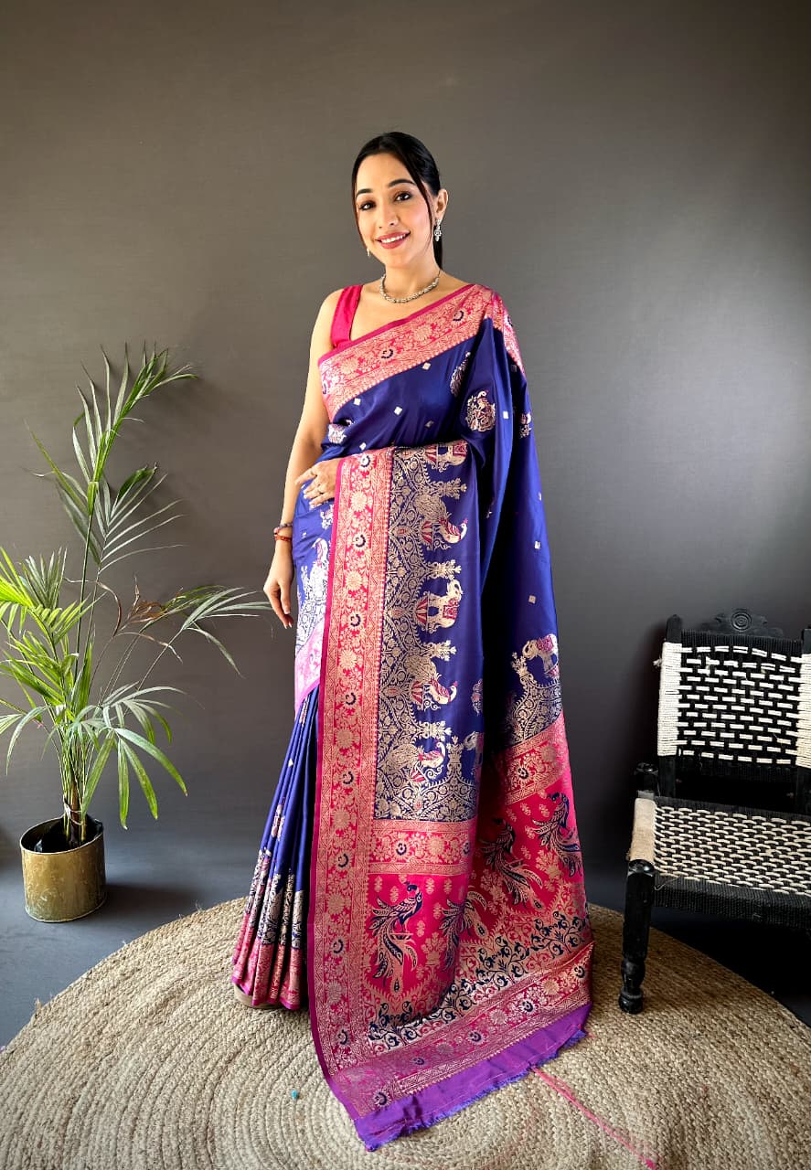 Blue and pink Banarasi silk saree with rich pallu and meenakari weaving for festive wear  
