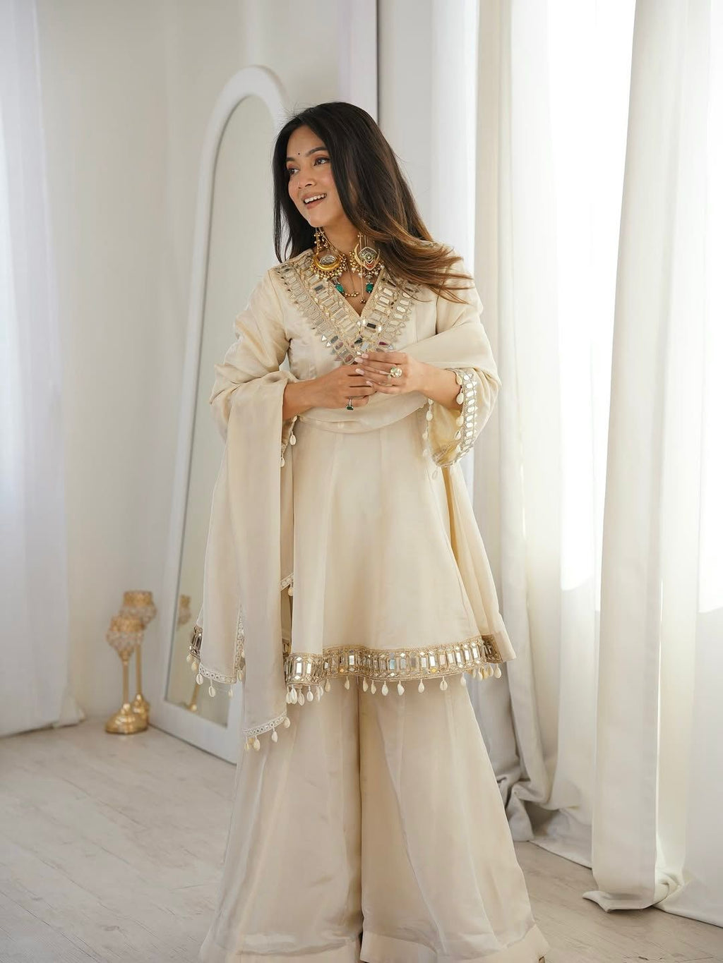 Cream sharara suit with mirror work lace
