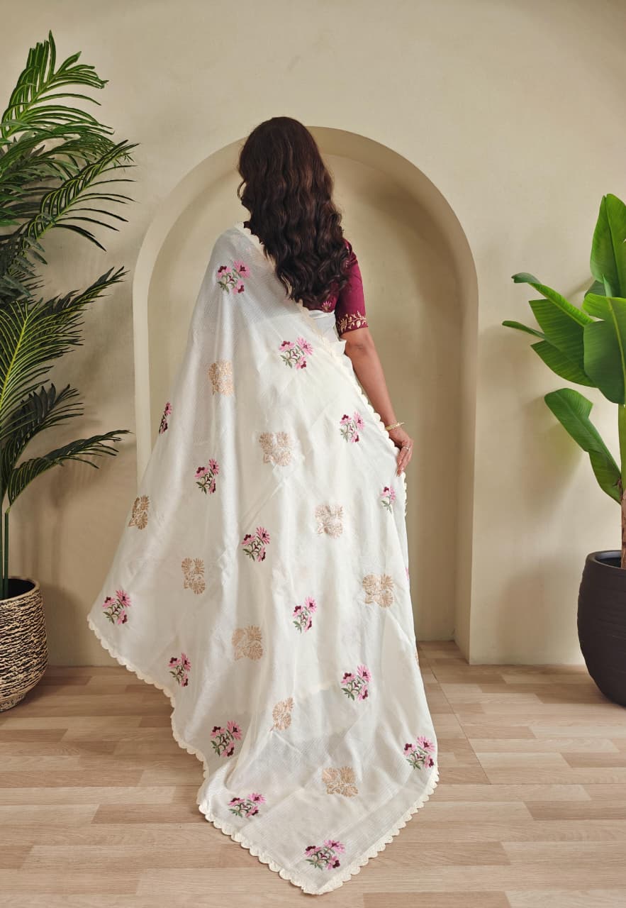 embroidered white saree