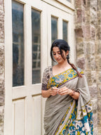Traditional Kalamkari saree with modern styling
