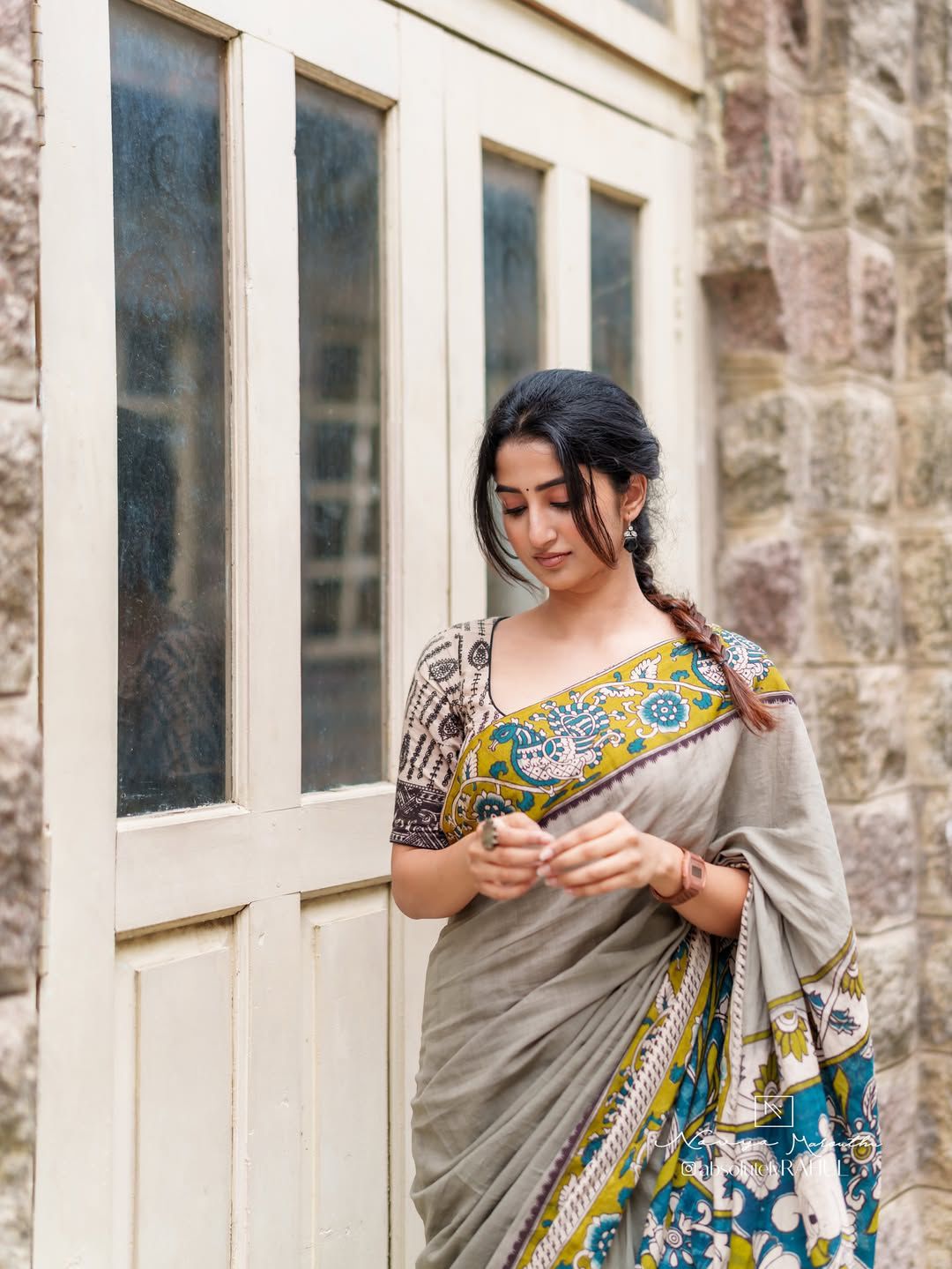Traditional Kalamkari saree with modern styling
