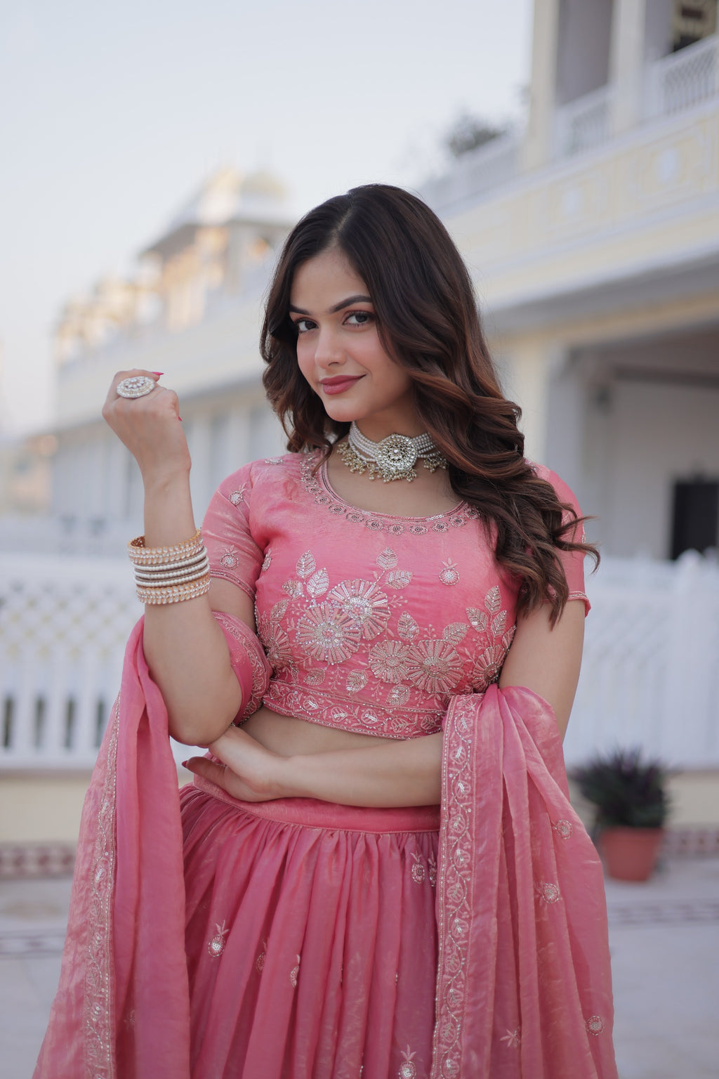 Close-up of sequins and zari embroidery work on lehenga choli
