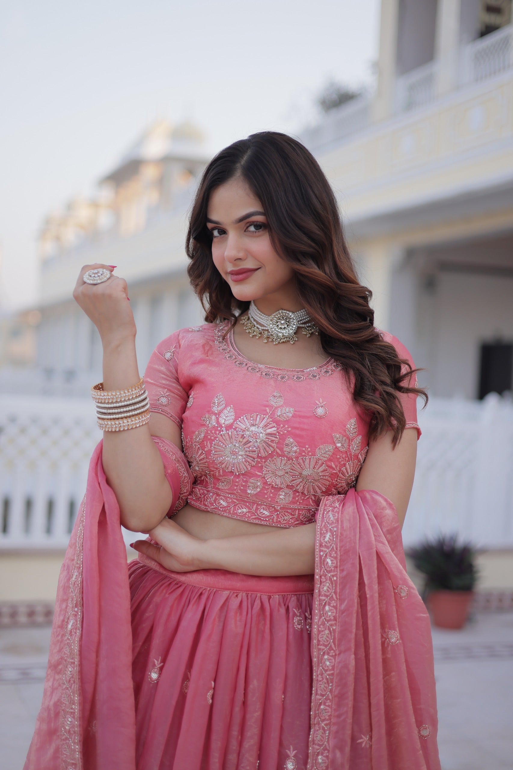 Close-up of sequins and zari embroidery work on lehenga choli
