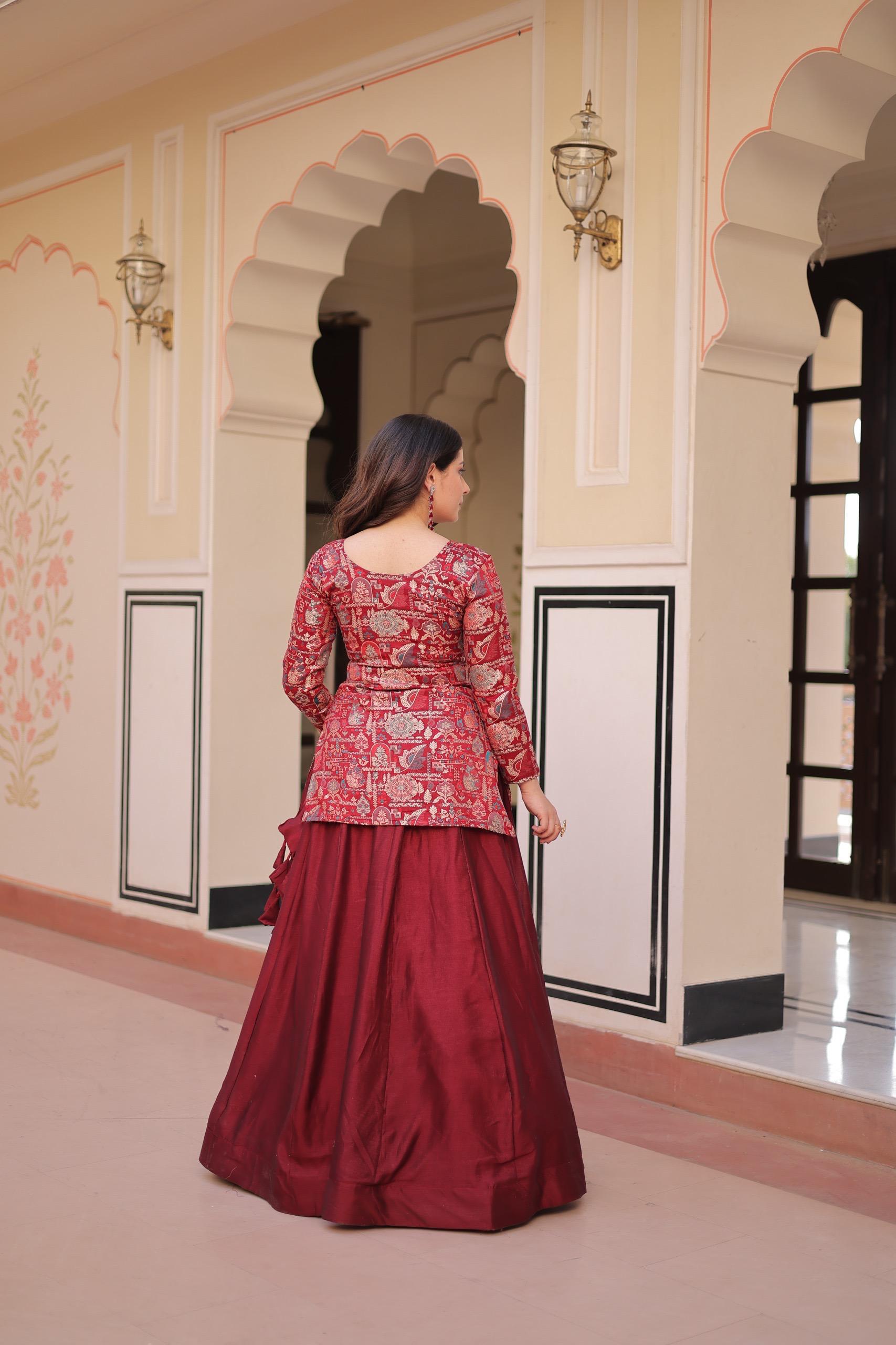 Maroon lehenga choli back design with traditional ethnic pattern blouse
